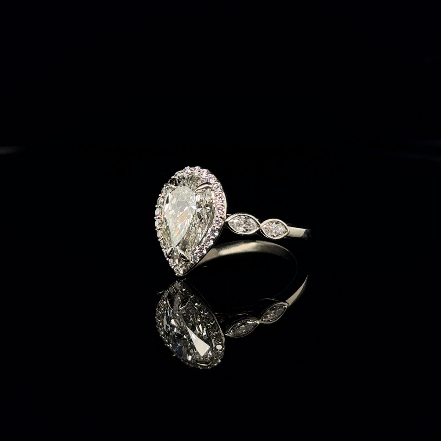 PEAR SHAPE DIAMOND HALO ENGAGEMENT RING