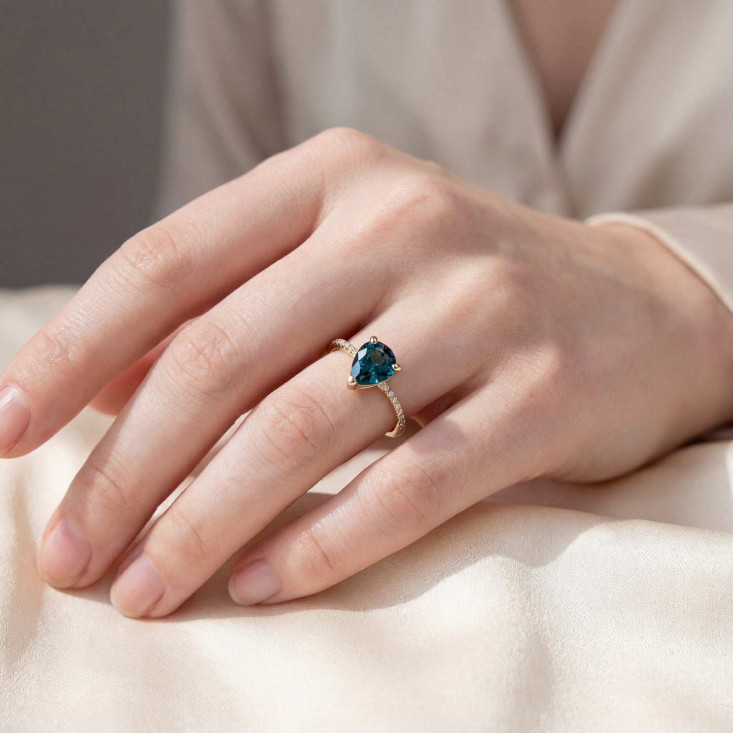 THREE-PRONG PEAR TEAL SAPPHIRE ANNIVERSARY OR PROMISE RING