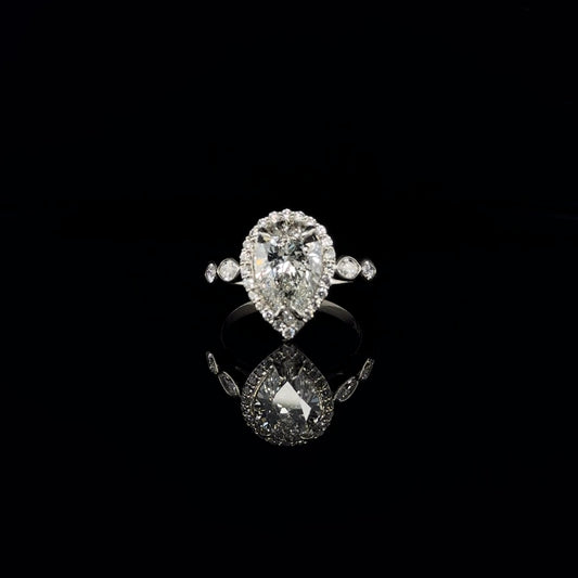 PEAR SHAPE DIAMOND HALO ENGAGEMENT RING