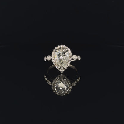 PEAR SHAPE DIAMOND HALO ENGAGEMENT RING